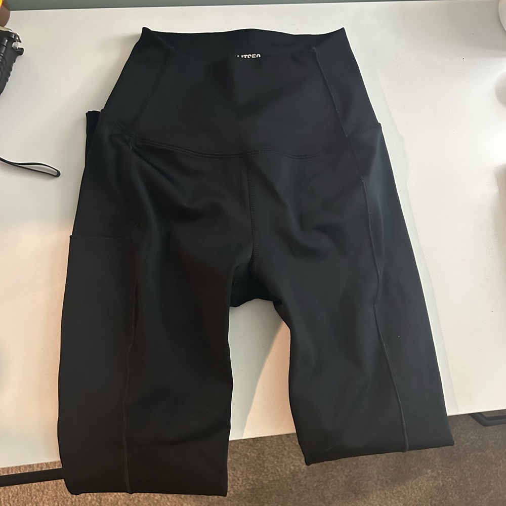 Brand new worn once to try on 7/8 length
